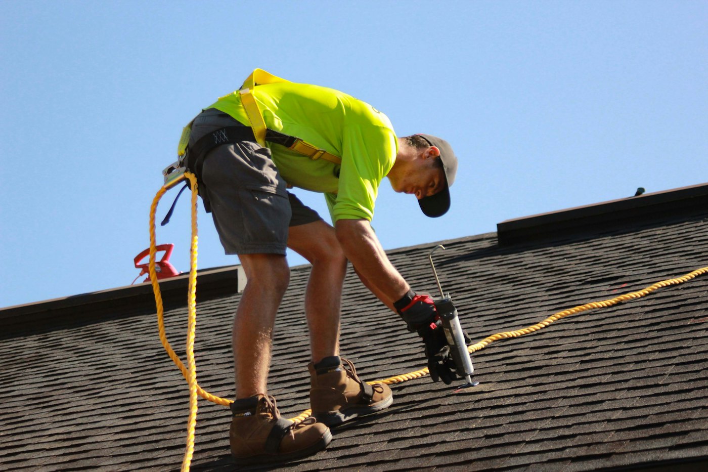 Technician working on a residential roof